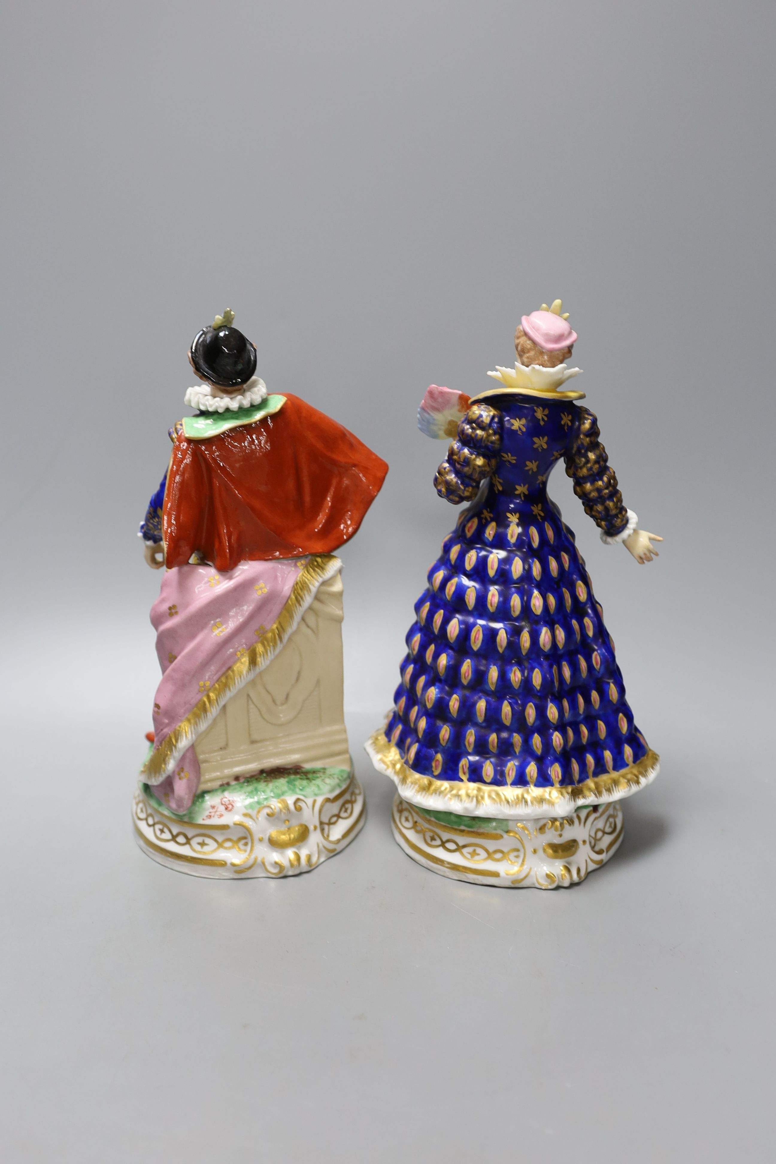 A pair of French porcelain court figures - 25cm tall
